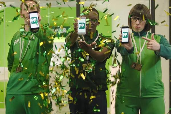 a group of people holding phones